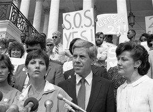 Candy Lightner, left, founder and president of (MADD) Mother Against Drunk Drivers, faces reporters, on June 14, 1983, at Capitol Hill, Washington. Lightner is joined by Sen. Richard Lugar, R-Ind., and Transportation Secretary Elizabeth Dole. The three favor a national drinking age of 21.