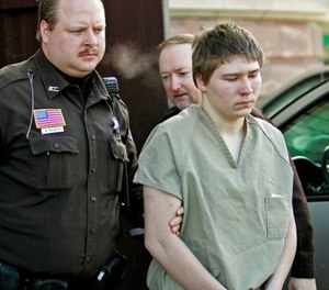 In this March 3, 2006, file photo, Brendan Dassey, is escorted out of a Manitowoc County Circuit courtroom in Manitowoc, Wis. (AP Photo/Morry Gash, File)