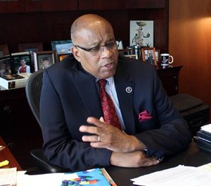 U.S. District Judge Michael Davis seeks a way to turn defendants from violent extremism. (AP Photo/Jeff Baenen)