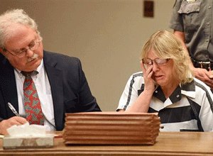 Joyce Mitchell cries as she sits with her attorney Stephen Johnston in court on Tuesday July 28, 2015 in Plattsburgh, N.Y. (Rob Fountain/The Press-Republican via AP, Pool)
