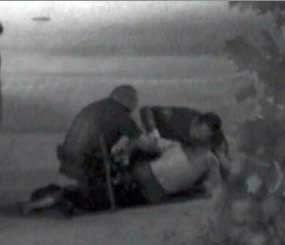 A still frame from security camera video captures Kelly Thomas' encounter with police.