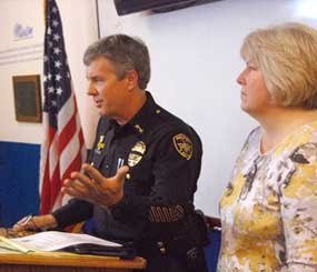 Medford Police Chief Tim George and Jackson County District Attorney Beth Heckert brief the press Wednesday, Nov. 13, 2013, on an improvised explosive device that blew out windows at the DA's office in a predawn blast.