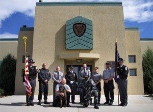 Oregon correctional employees wear a wide array of uniforms, as this 2006 file photo demonstrates. The sons and daughters of five correctional workers recently won scholarship awards.