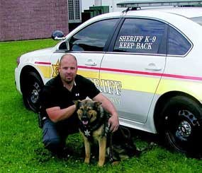 Ozzie and his handler Deputy John Demeo (Delaware County Sheriff's Office Image)