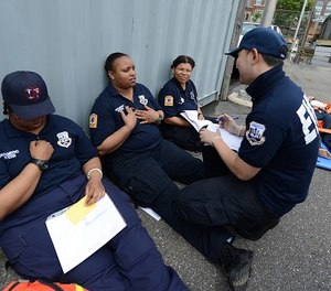 Paramedic students hold a mock disaster drill.
