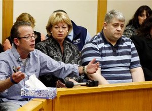 Dean Smart, far left, speaks Thursday March 12, 2015, during a parole hearing at the state prison in Concord, N.H. for William “Billy” Flynn who shot and killed his brother nearly 25 years ago. Flynn was 16 in 1990 when he and three friends carried out what prosecutors said was Pamela Smart's plot to murder her husband Gregg Smart.