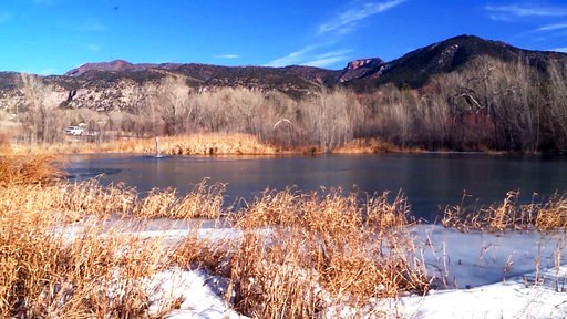A pond in New Harmony, Utah, is shown after an 8-year-old boy fell into it and was rescued on Monday.