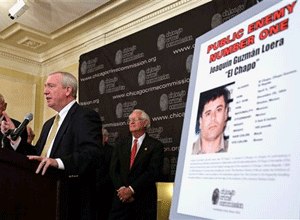Al Bilek, executive vice president of the Chicago Crime Commission, Jack Riley, Special Agent In Charge for the DEA, Chicago Field office, and Peter Bensinger former administrator of the U.S. Drug Enforcement Administration announce that Joaquin