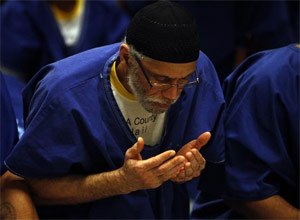 Malcolm Joseph Moore participates with fellow inmates in the Jumu'ah prayer service at Men's Central Jail.