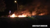 Fully involved tractor-trailer