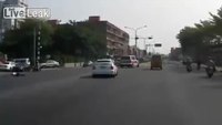 Ambulance nearly strikes pedestrian 