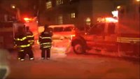 FDNY fire truck tows ambulance during blizzard