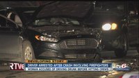 2 firefighters, EMT hurt when car drives into accident scene