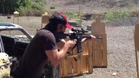 Keanu Reeves shows off his shooting skills