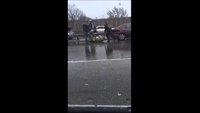 EMS improvises to move patient on icy road