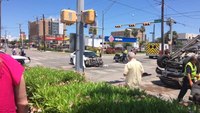 Car T-Bones and flips ambulance in intersection