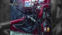 Firefighters rescue man trapped in 6-car pileup
