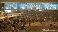 Hong Kong police resort to tear gas to break up democracy protesters