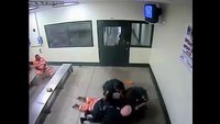 Inmate slams officer to ground, pummels him