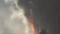 Arrival video at 2-alarm Baltimore house fire