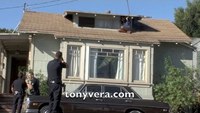 LA cops rescue woman from rooftop burglar