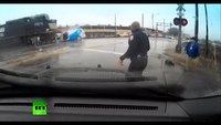 Ohio cop saves driver moment before train smashes into van