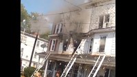 Ladder falls into wires at 3-alarm fire