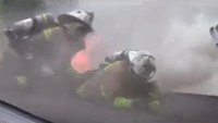Close Call: Firefighter Almost Falls Through Roof