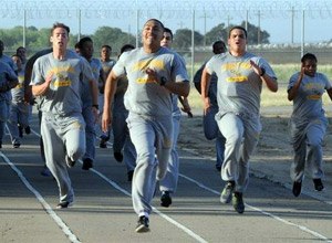 Sebastian Brown, center, does wind sprints Thursday with other youth correctional officers at the California Department of Corrections and Rehabilitations Stockton Training Facility.