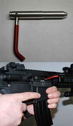 The Safe Cycle's red handle serves as a visual for the weapon's owner that it will not fire rubbing up against other equipment or a part of the vehicle. (Photo courtesy WarriorTech)