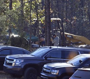 Excavation and search work continues on Todd Kohlhepp's property in Woodruff, S.C. Monday, Nov. 7, 2016. (AP Photo/Richard Shiro)