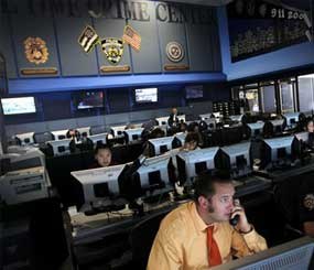 Employees work inside the Real Time Crime Center at New York police headquarters. 10 years after the Sept. 11 terror attacks, emergency agencies are better equipped for communication in a disaster