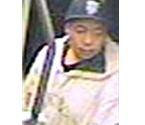 This image taken from a surveillance video and provided by the San Francisco Police Department show suspect Nikhom Thephakaysone on a MUNI train in San Francisco.