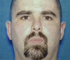 This undated file photo provided by the Federal Bureau of Investigation shows Sikh temple shooter Wade Michael Page. The FBI said Wednesday, Aug 8, 2012, that Page died of a self-inflicted wound after he was shot by police. (AP Photo/FBI, File)