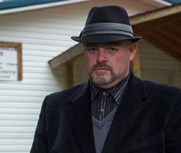 In this 2013 photo provided by National Geographic Channel, Jamie Coots, a pastor in Middlesboro, Ky., who appeared on the National Geographic television reality show