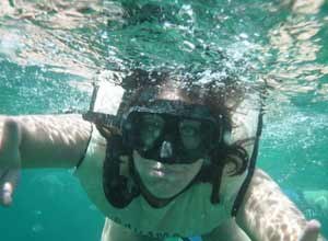 A woman snorkels in the Bahamas. Even paradise can be dangerous.