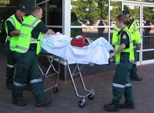 ACTAS Paramedics transport a mock-victim during a mass casualty exercise in Canberra.