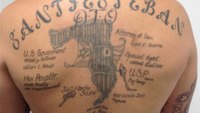 With bizarre tattoo, Miami inmate puts his troubles behind him - literally