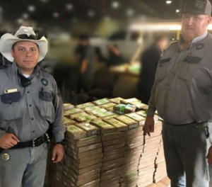 Two sergeants found cocaine in a fruit shipment that led to the discovery of 540 packages of cocaine hidden in the boxes.