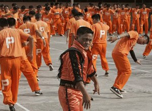 Inmates at the Cebu Provincial Detention and Rehabilitation Center on the island province of Cebu in central Philippines dance to the late Michael Jackson's