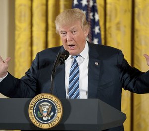 In this Sunday, Jan. 22, 2017, file photo, President Donald Trump speaks during a White House senior staff swearing-in ceremony in the East Room of the White House, in Washington.