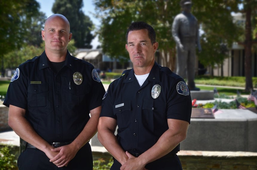 Westminster PD Commanders Cord Vandergrift, left, and Darin Upstill are among several current and retired WPD officers lobbying to get Sgt. Tom Richard’s name added to the Westminster Police Department Memorial. (Photo/Steven Georges/Behind the Badge)