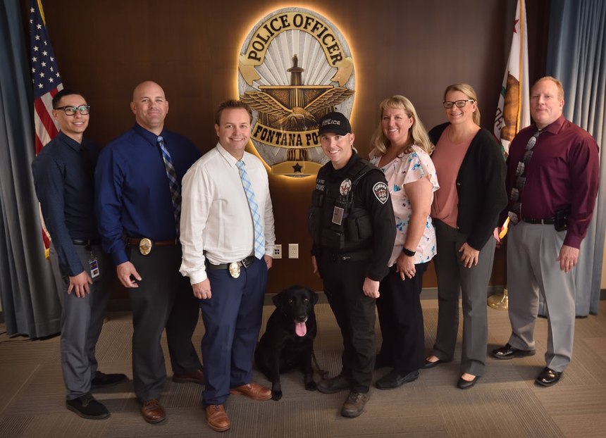 Members of the Fontana PD’s Internet Crimes Against Children (ICAC) detail are, from left, Computer Forensics Technician Brandon Canary, Corp. Brad Guith, Det. Justin Moyer, K9 Officer Mark Wyrick with K9 Officer Goose, Det. Heidi Kouroubacalis, Det. Vanessa Waggoner, and Sgt. Darren Robbins.