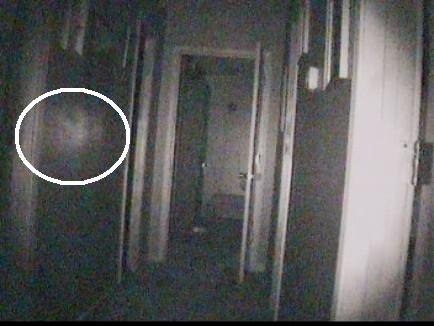 A still image from a Paranormal 911 investigation shows a mysterious orb.