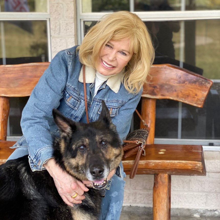 M.A.S.H. star Loretta Swit visited the Mission K9 Rescue Veteran K9 Ranch and loved all the dogs. She is pictured here with contractor working dog Deny from Kuwait.