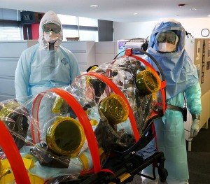 The Superior Ambulance team practices transporting a patient with a highly infectious disease; Ebola in this scenario.