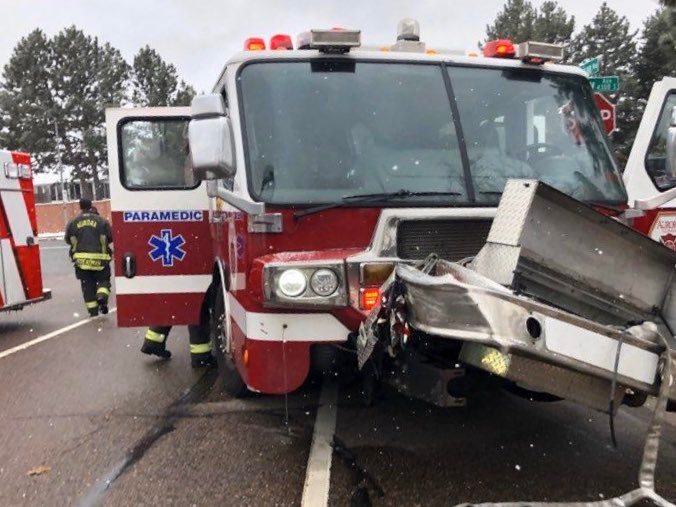 Four Colorado firefighters were injured when their fire apparatus collided with another vehicle.