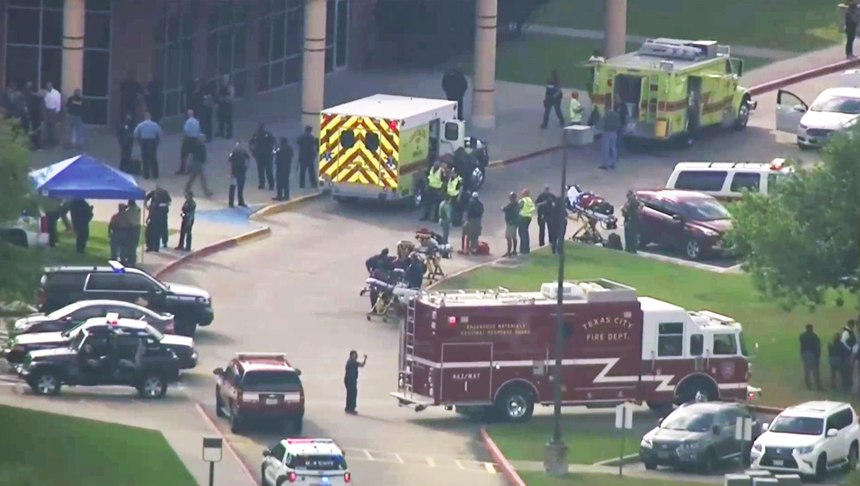 In this Friday, May 18, 2018 file image taken from video, emergency personnel and law enforcement officers respond to a high school near Houston after an active shooter was reported on campus, in Santa Fe, Texas. (KTRK-TV ABC13 via AP, File)