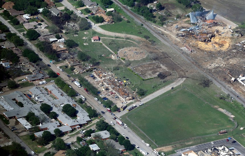 An April 18, 2013, aerial photo shows the remains of a nursing home, apartment complex and fertilizer plant destroyed by an explosion at a fertilizer plant in West, Texas. Images of a massive explosion in the Lebanese capital looked depressingly familiar to West Mayor Tommy, whose small town in 2013 was partly leveled by one of the deadliest fertilizer plant explosions in U.S. history.