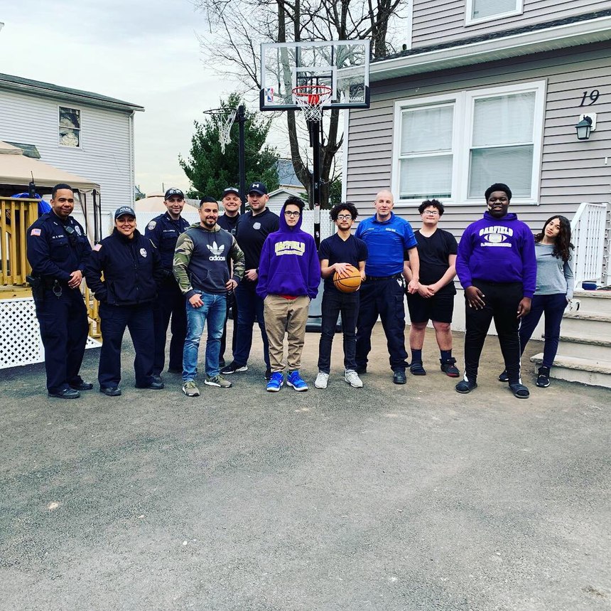 Garfield Police Department officers playing with local kids (Photo / Garfield Police Department)